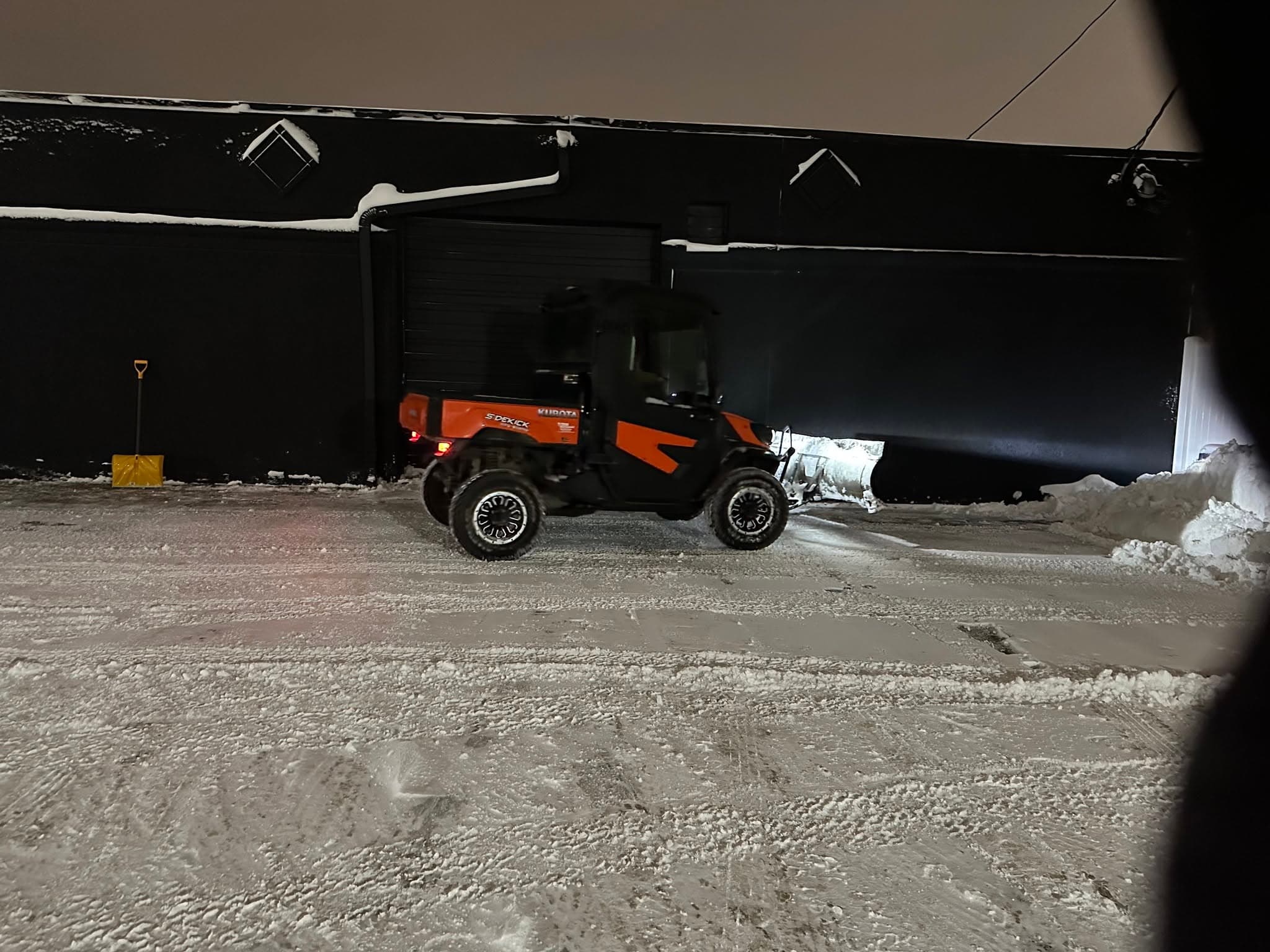 Snow removal with Kubota side-by-side plow — Fargo ND